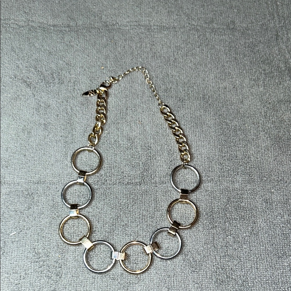 NY Silver Gold Necklace with Circular Rings and Polished Finish